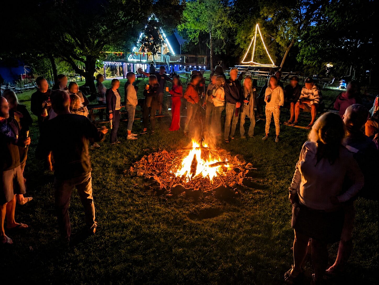 Gathered around the fire ring at night